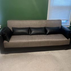 Couch, Pillows Included And Storage Area 