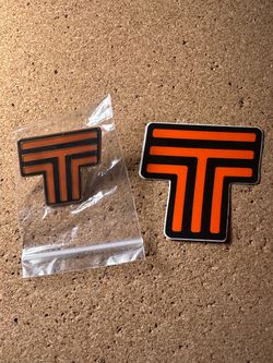Triumph / Rips by Triumph Collectible Pin + Sticker