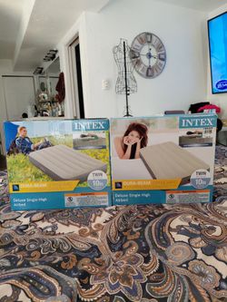 2 twin brand new blow up mattresses