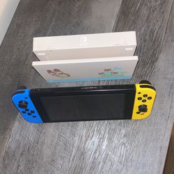 Nintendo Switch (with Accessories & Games)