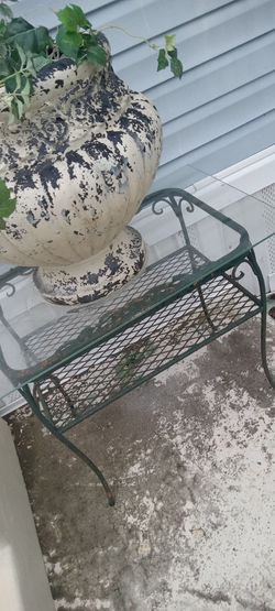 Metal coffee table with glass top