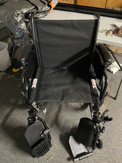 Black Folding Wheelchair with Foot rests