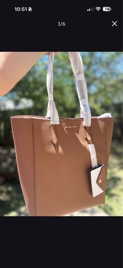 This is a Michael Kors Vincent Large Saffiano Leather Tote Bag in the color Luggage.