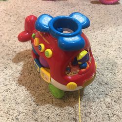 Pull along musical toy Helicopter 