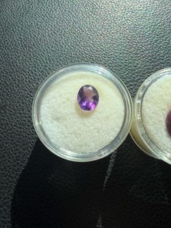 faceted oval-cut amethyst gemstone