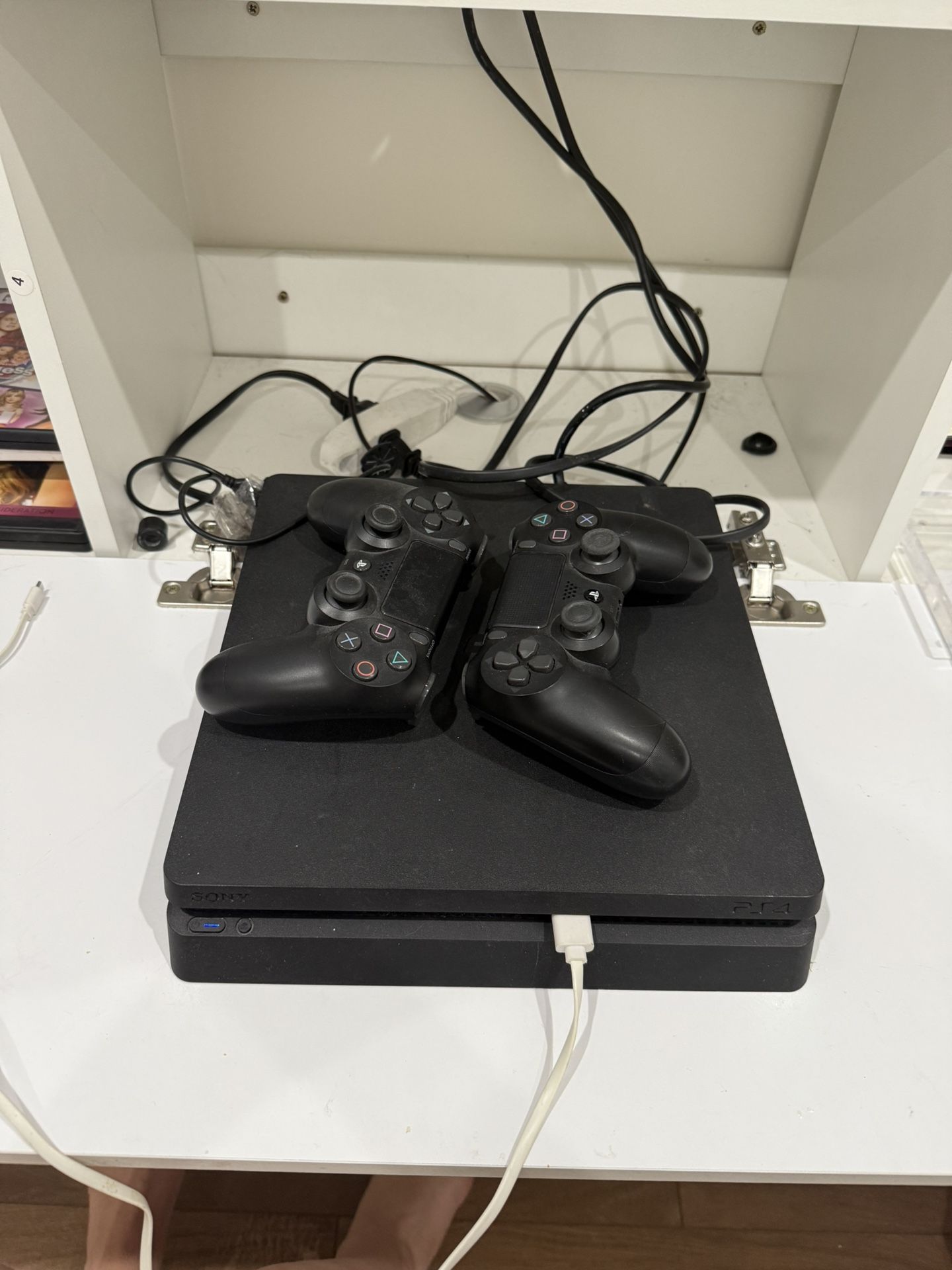 PS4 With 2 Controllers And 8 Games