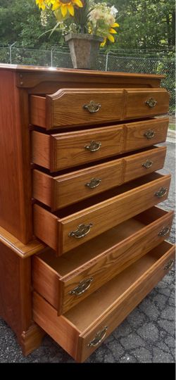 Solid wood tall chest with big drawers. Drawers sliding smoothly
