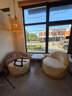 Pair of Rattan Swivel Lounge Chairs