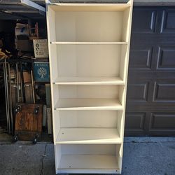 Matching pair of white 5 - shelve library style bookcases! Ajustable shelves!  Priced separately!