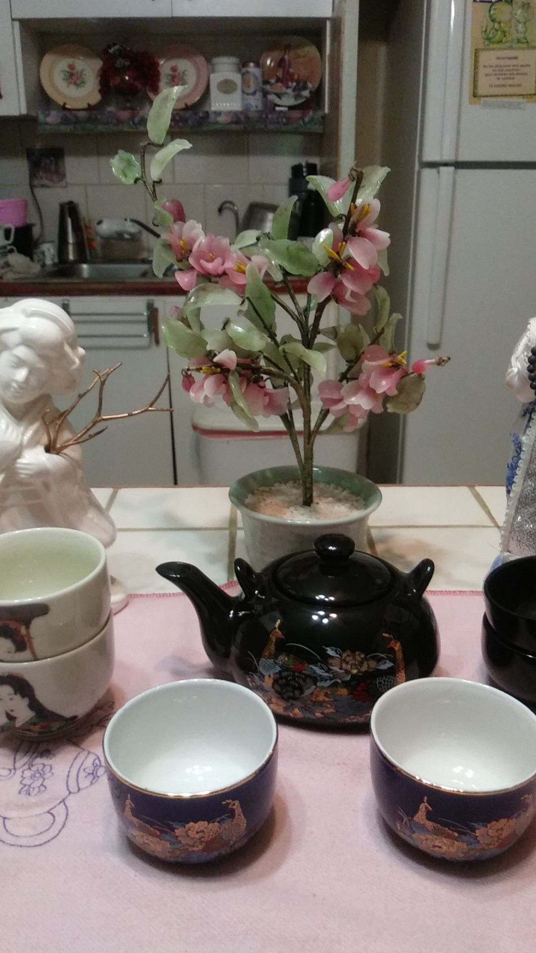 Oriental tea set with sculptures