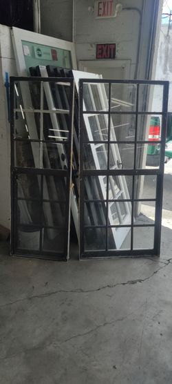 2 aluminum hurricane 🌀 impact single Hung windows sold separately with grid 26 and 36 x 73.5