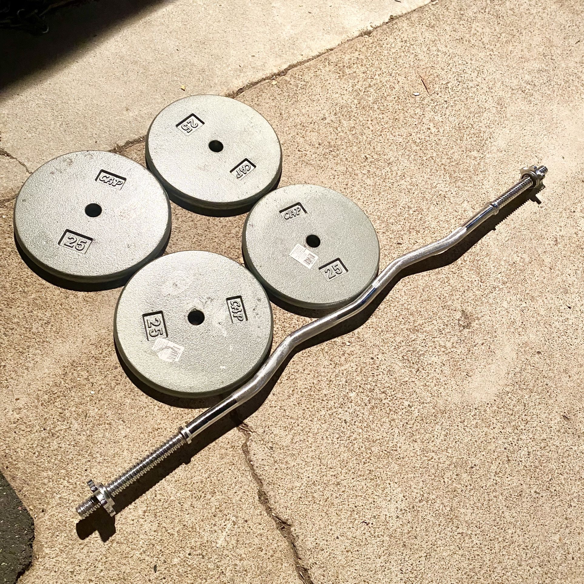 Curl Bar With 4-25lb Plates 