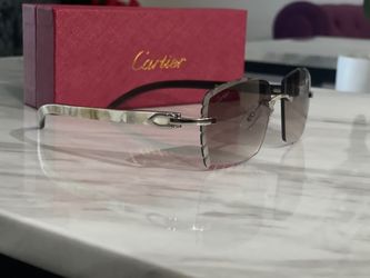 Cartier glasses - white buffs