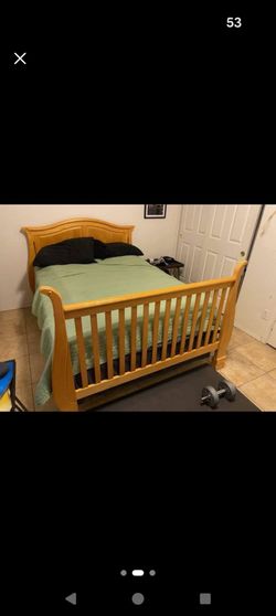 Full size bed converts to crib or day bed