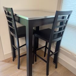 Stainless Steel Bar Table And Two Barstools
