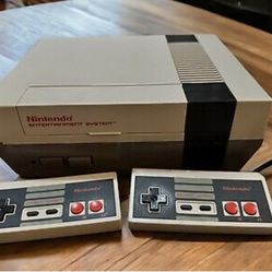 Nintendo System  ÷ 2 Remotes