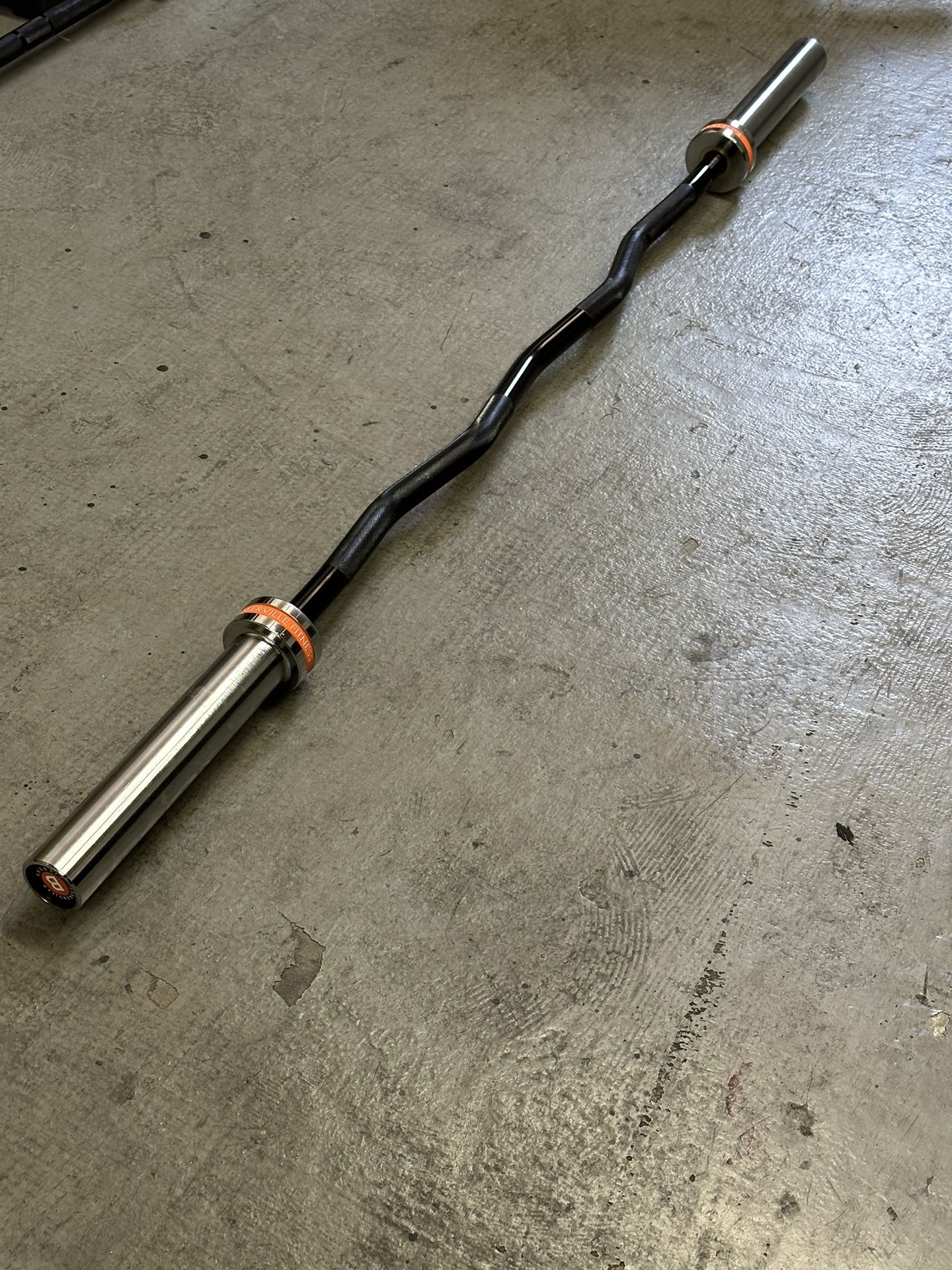 Olympic Needle Bearing Curl Bar. Brand new still in the box.