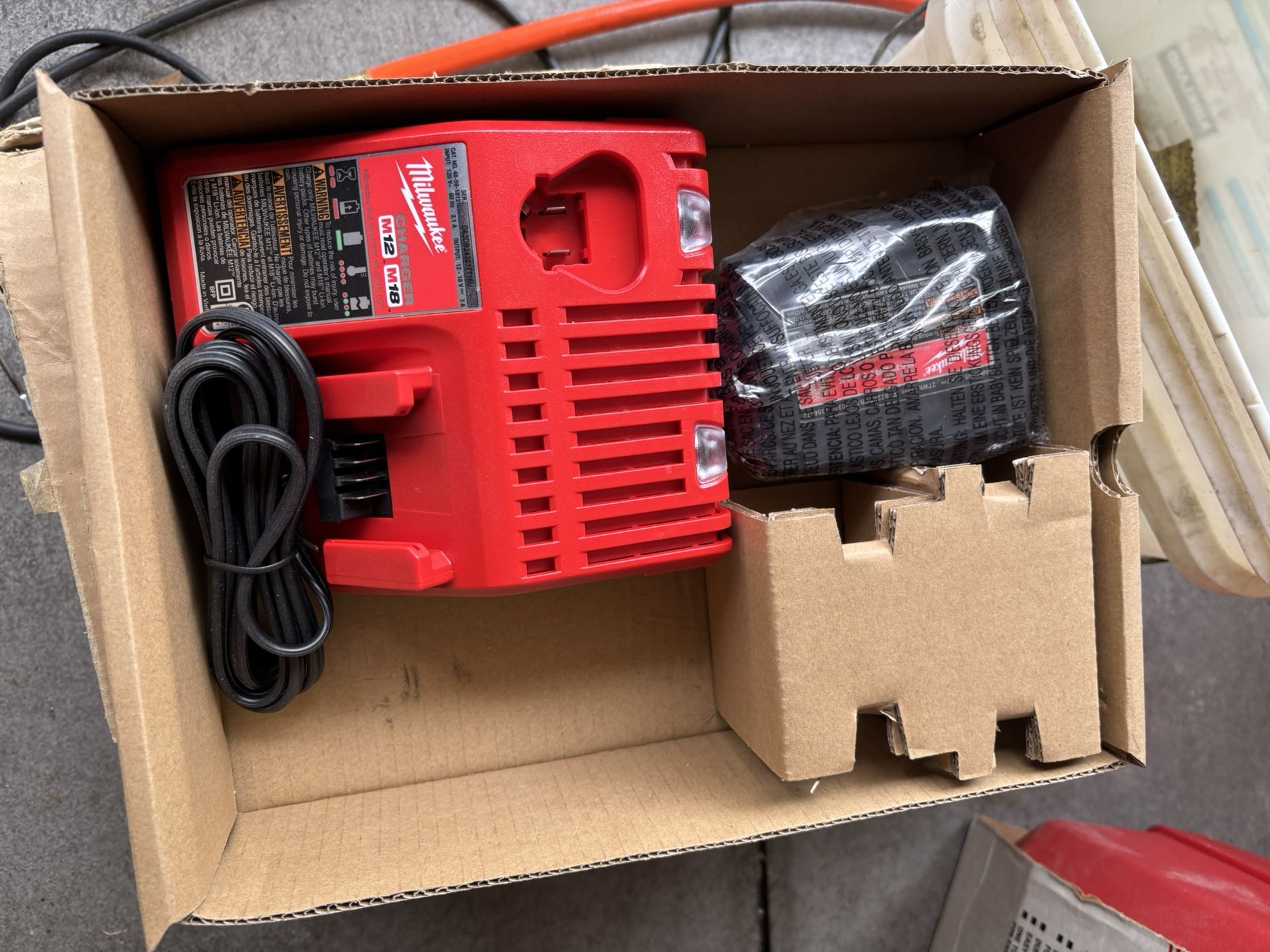 Milwaukee Battery and Charger 