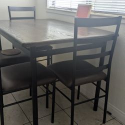 1 Table and 4 Chairs 