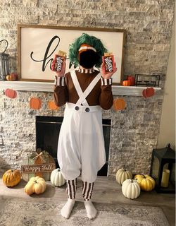 Men’s S Oompa Loompa costume. Jumpsuit, wig , eyebrows & orange face paint. Only worn for pics.
