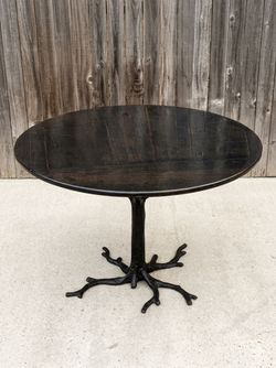 Selling a stunning, high-end Faux Bois Dining Table by luxury designer brand Global Views. This is an incredible statement piece that blends sculptura