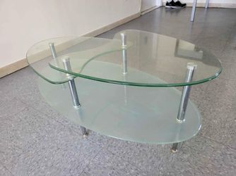 Oval glass coffee table