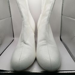 Size 6.5--7, a white faux-snakeskin ankle boot