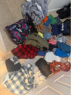 Kids size 5/6 clothing and sleeping bag/blanket.  All for $5