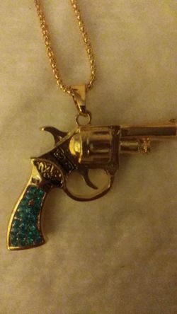Necklace, pistol, turquoise crystals, 20$