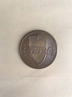 19 £.33 Forde brass token