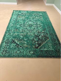 Green floor rug