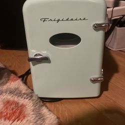 Teal mini fridge