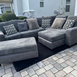 Gray 4 Piece Sectional and Black rug