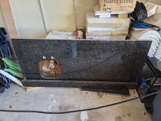 Free black granite countertop with sink cutaway
