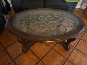 Oval Glass Top Coffee Table with Scrollwork