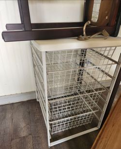 Metal Bins they pull out for storage