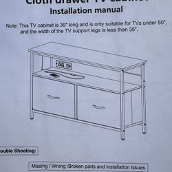 New 39” TV stand with two drawers, outlets, and LED lighting with remote.  For TVs up to 50”
