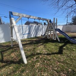 Swing set with slide