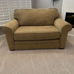 Loveseat with pullout mattress 