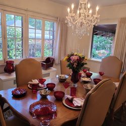 A stunning solid oak table with an accompanying leaf.