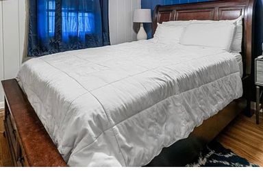 Queen sized bed and mattresses.