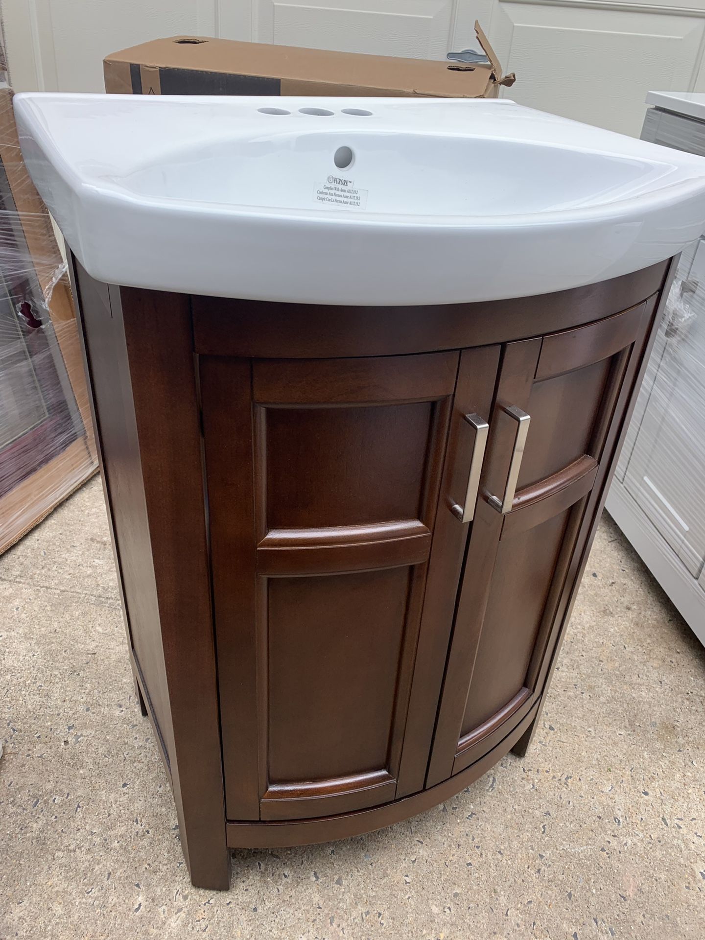New,no box. Style Selections Morecott 23.75-in Chocolate Single Sink Bathroom Vanity with White Vitreous China Top Item # 819964 Model # 1142VA-24-220