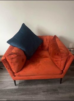 Burnt orange velvet down largreading chair