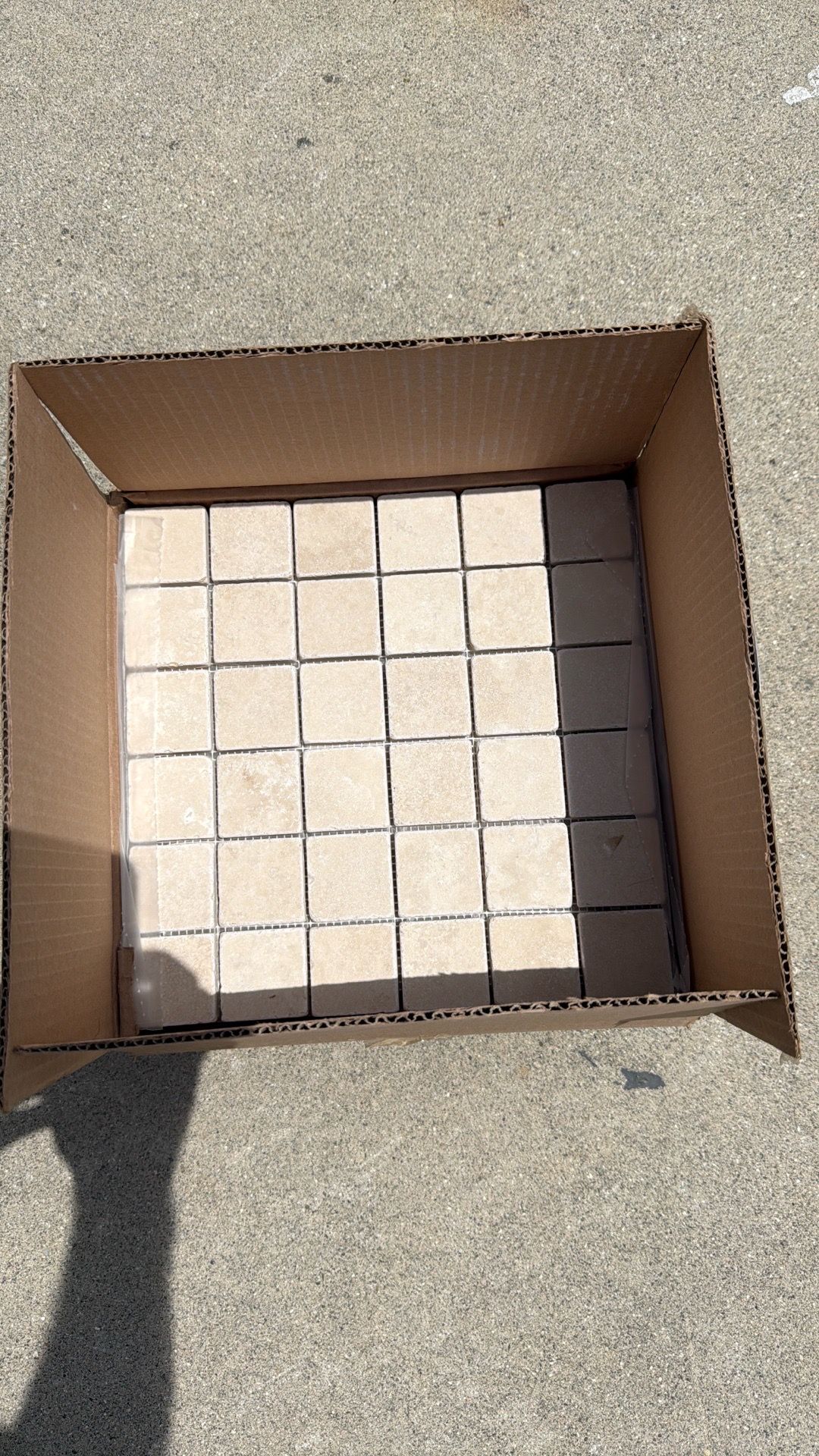 2x2 mosaic travertine tiles on 1’x1’ mesh