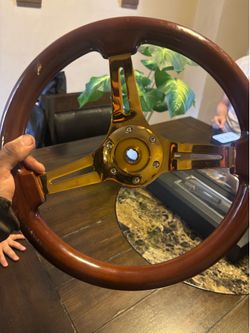 Steering wheel racing with the part to put it in the car fits Honda accord 2005
