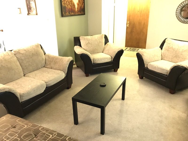 Living room set - 1 love seat - 2 sofa couches with Coffee Table included