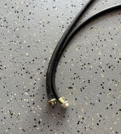 Durable black hose with metal connectors, suitable for various uses. both for $10
