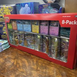 PRISMATIC EVOLUTIONS 8 TIN PACK