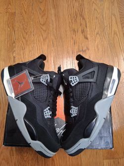 Air Jordan 4 Retro Black canvas.