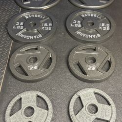 BRAND NEW Olympic  Weights Plates Set: 45s, 35s, 25s & 10s . Btute#230